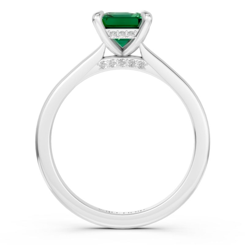 Emerald cut solitaire emerald engagement ring in white gold, side profile