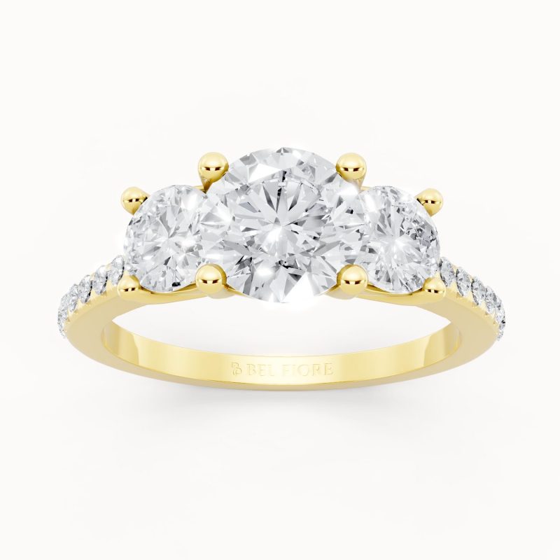 Classic Round Three Stone Engagement Ring in yellow gold, front view