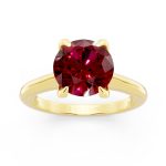 Cathedral Solitaire ruby Engagement Ring in yellow gold, front view