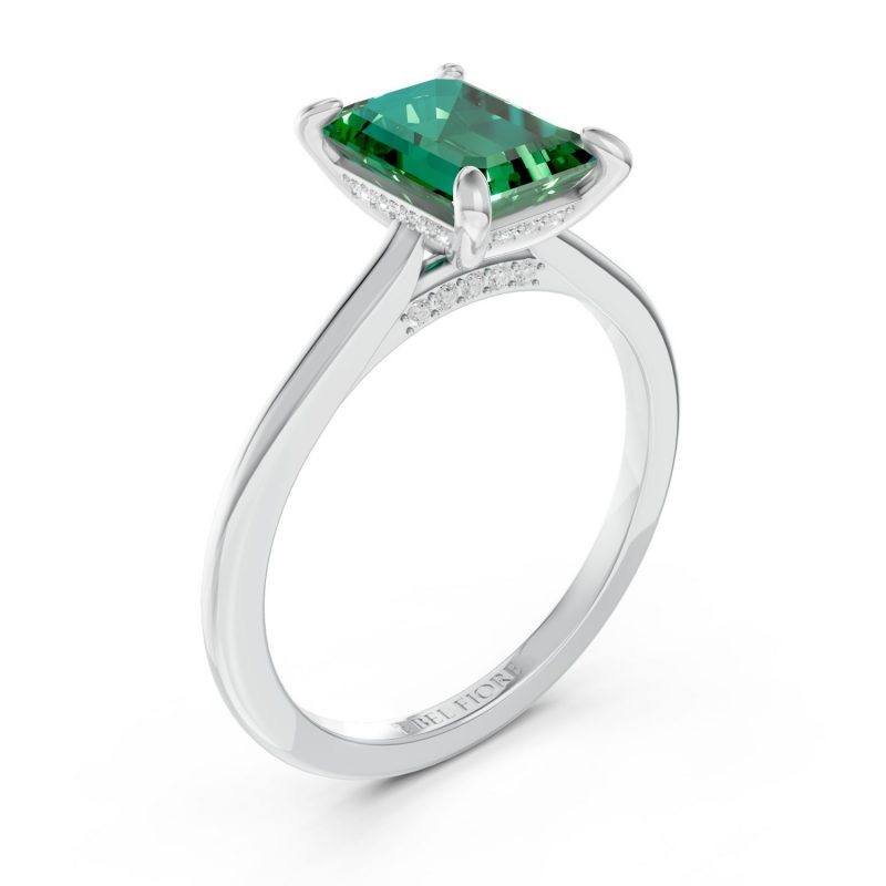Emerald cut solitaire emerald engagement ring in white gold, top view