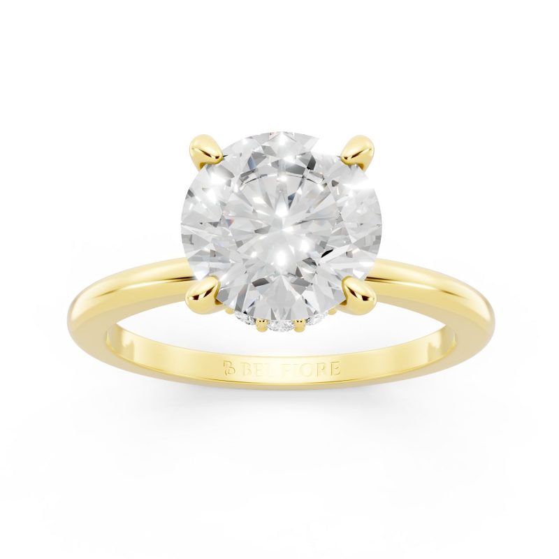 Hidden halo white diamond engagement ring in yellow gold, front view