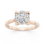Softly sculpted solitaire white diamond engagement ring in rose gold, front view