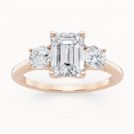 elegant-emerald-round-trilogy-ring