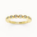 Bezel-Set Diamond Wedding Band in yellow gold, front view