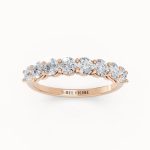 Claw-Set Diamond Wedding Band in rose gold, front view